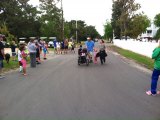 2 year-old Camryn leads her parents to the finish line in the 2015 Family Fun Run